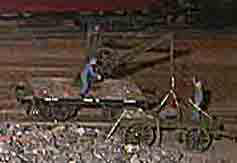      Bruchsteine umladen   ....   